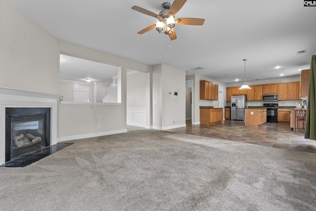 420 Indigo Ridge Dr, Columbia, SC 29229 - unfurnished living room featuring visible vents, a ceiling fan, dark carpet, recessed lighting, and a fireplace with flush hearth