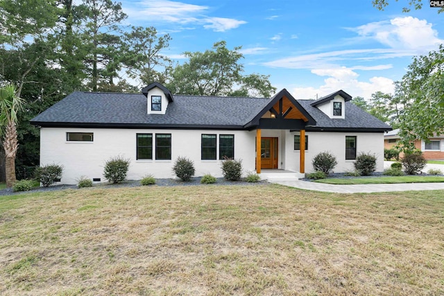 view of front facade with a front lawn