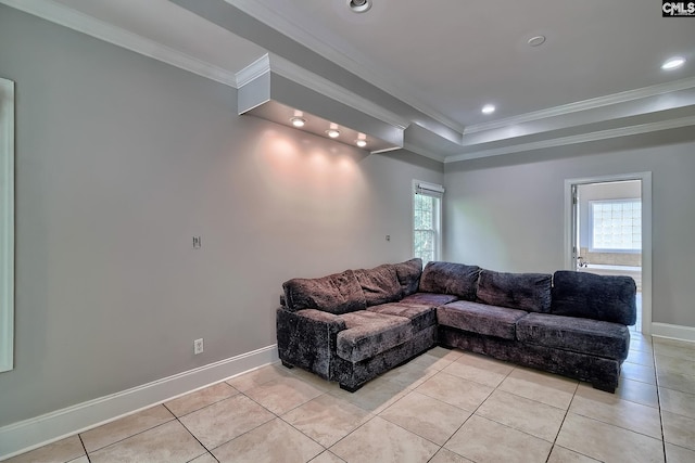 living room featuring crown molding, light tile patterned flooring, and plenty of natural light