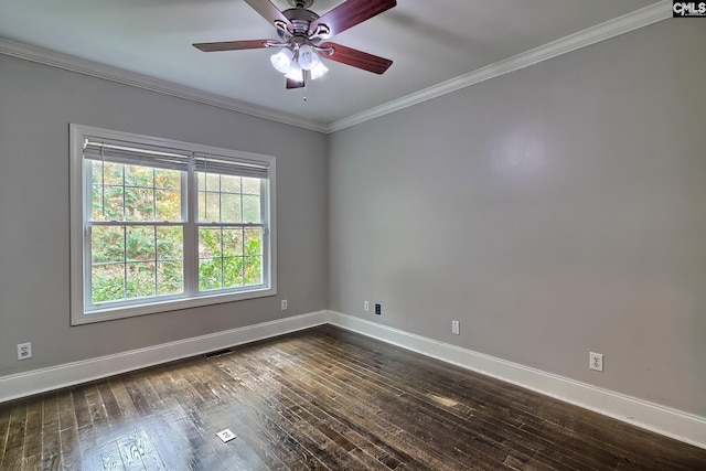 empty room featuring dark wood-type flooring, crown molding, and ceiling fan