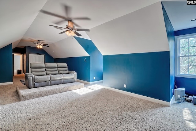 interior space with ceiling fan and vaulted ceiling