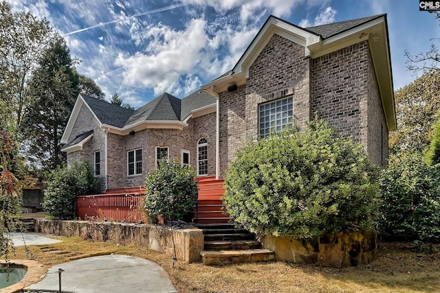 view of front of house with a patio area