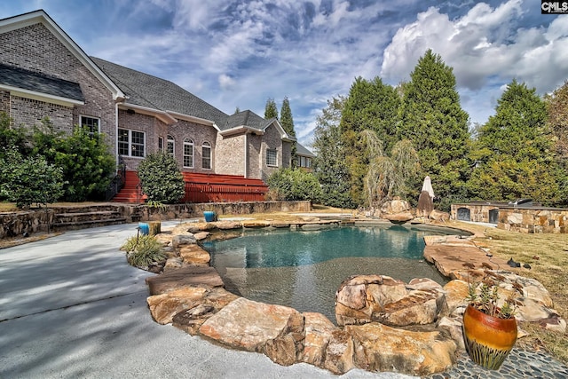 view of pool with a patio area