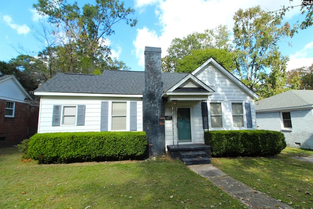 view of front of home with a front yard