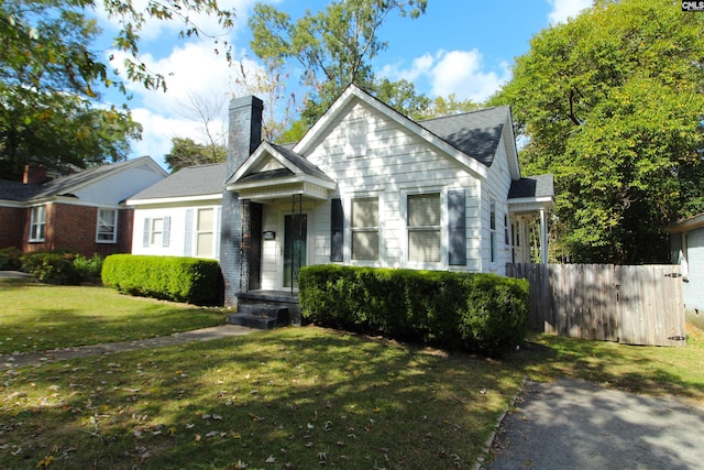 view of front of home with a front yard