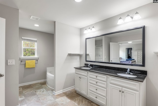 bathroom with vanity and plus walk in shower