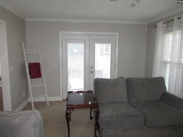 living room with french doors, crown molding, and carpet floors