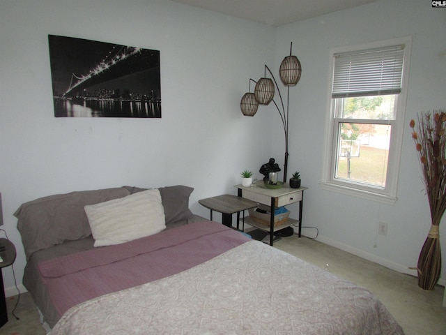 bedroom with light carpet