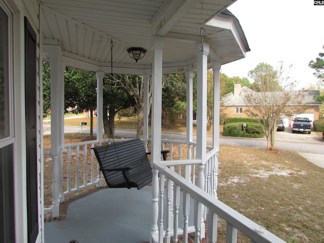 view of patio featuring a porch