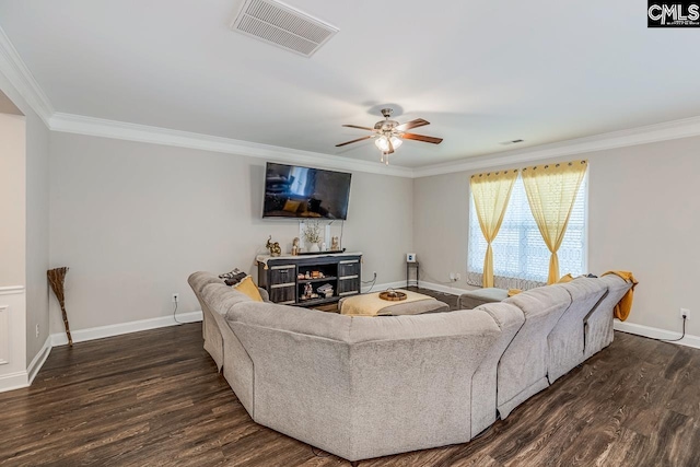 living room featuring ornamental molding, ceiling fan, and dark hardwood / wood-style flooring