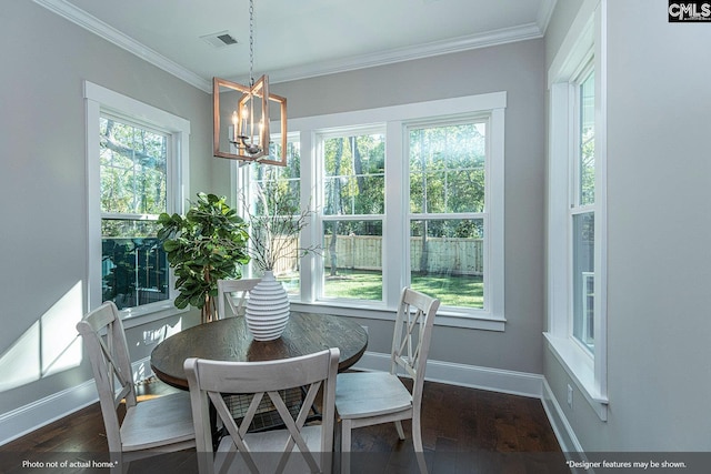 sunroom / solarium with a chandelier