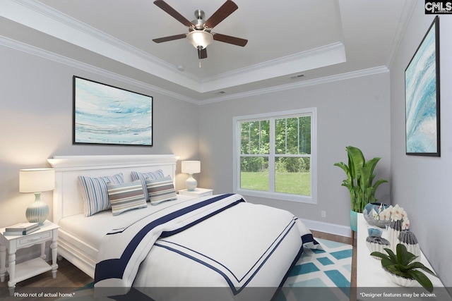 bedroom with crown molding, a raised ceiling, wood-type flooring, and ceiling fan