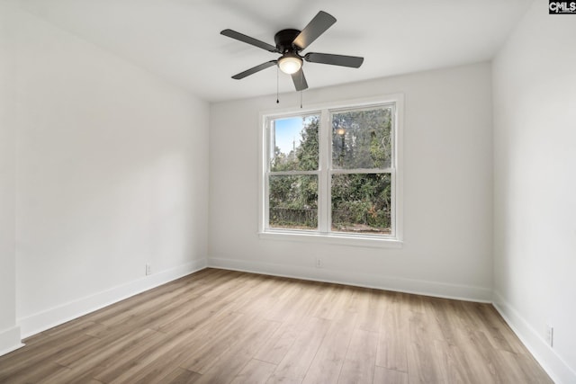 unfurnished room featuring light hardwood / wood-style floors and ceiling fan