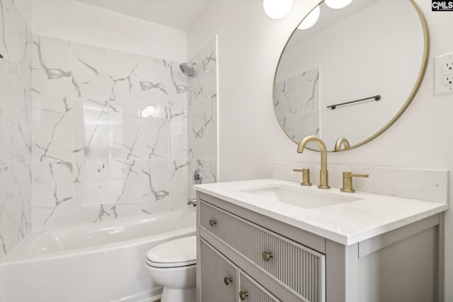 full bathroom with toilet, tiled shower / bath combo, and vanity