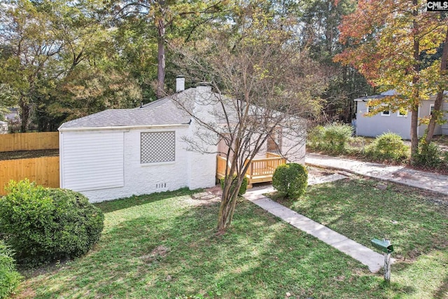 view of yard featuring a deck