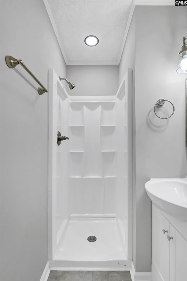 bathroom with vanity and walk in shower