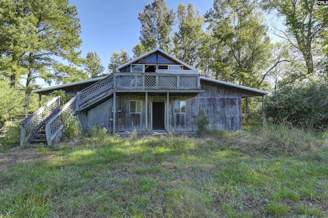 1490 Shiver Pond Rd, Camden, SC 29020 - back of property featuring stairs and a wooden deck