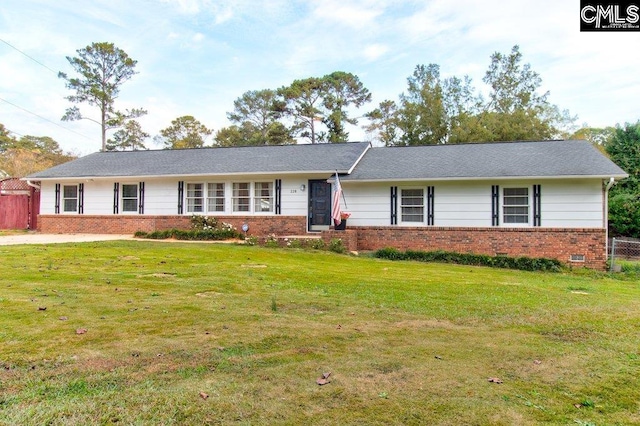 ranch-style home with a front yard