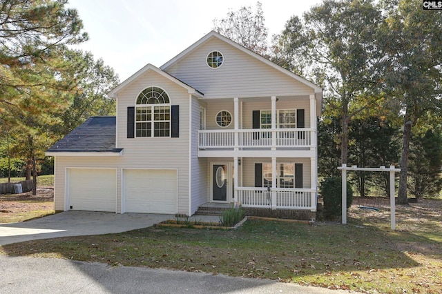 view of front of house with a porch, a garage, and a balcony