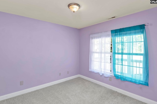 empty room featuring carpet floors