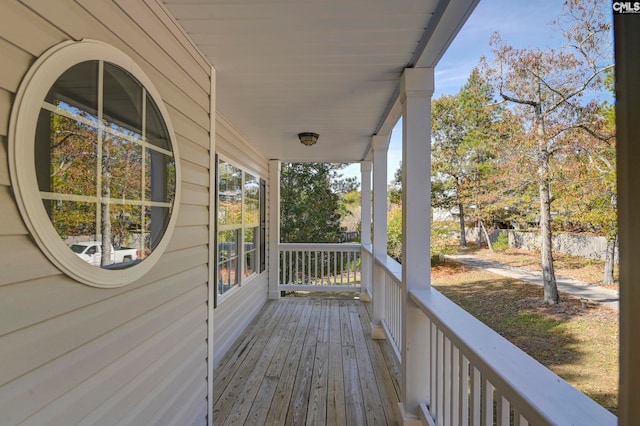 wooden deck featuring a porch