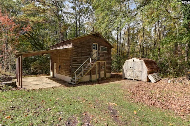 view of outbuilding with a lawn