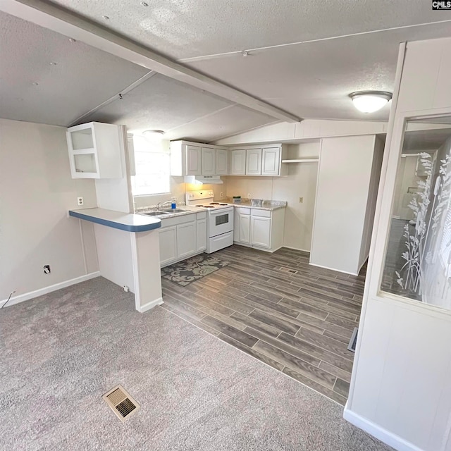 kitchen with kitchen peninsula, vaulted ceiling with beams, white cabinets, dark hardwood / wood-style flooring, and electric range