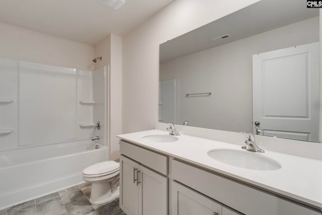 full bathroom with toilet, vanity, and shower / bath combination