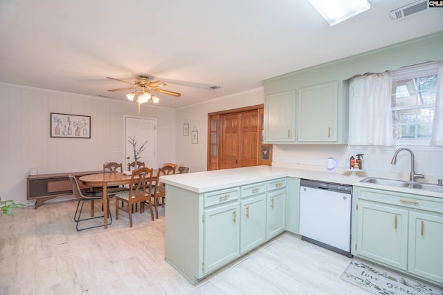 kitchen featuring sink, kitchen peninsula, ornamental molding, ceiling fan, and dishwasher