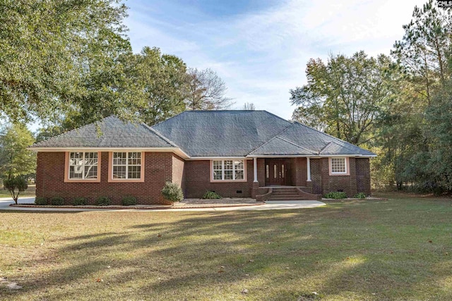 ranch-style house with a front lawn