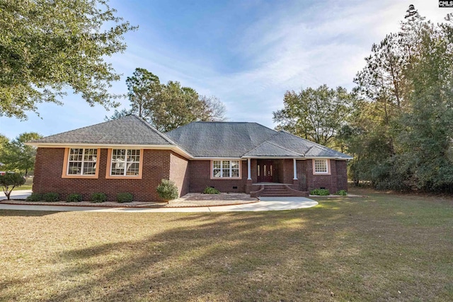 ranch-style home with a patio and a front yard