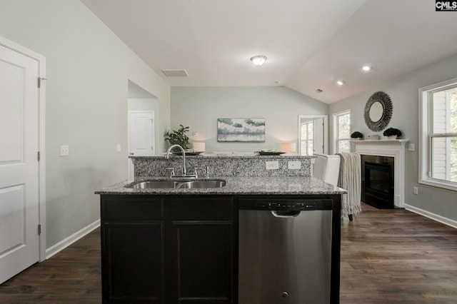 kitchen with lofted ceiling, dark hardwood / wood-style floors, sink, and dishwasher