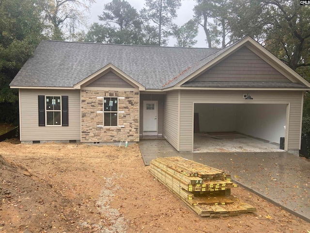 view of front of property with a garage