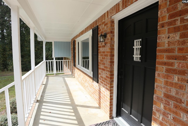 property entrance with a porch