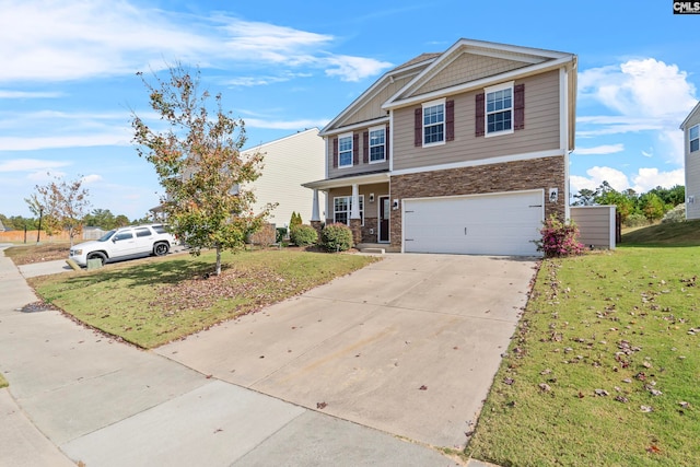 view of front of home featuring a front yard and a garage