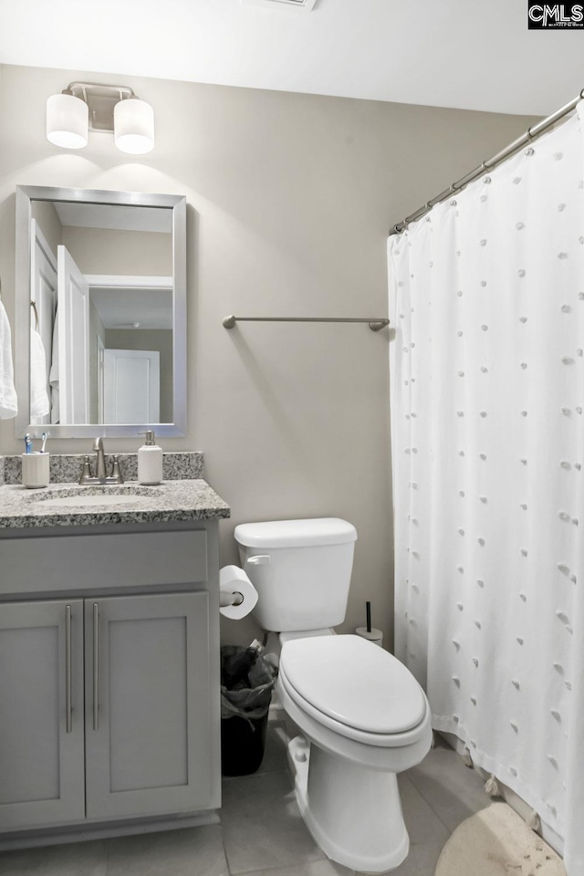 339 Newberg Rd, Chapin, SC 29036 - bathroom with toilet, tile patterned floors, vanity, and curtained shower