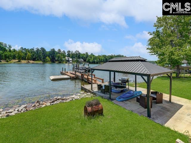 339 Newberg Rd, Chapin, SC 29036 - dock area featuring a lawn and a water view