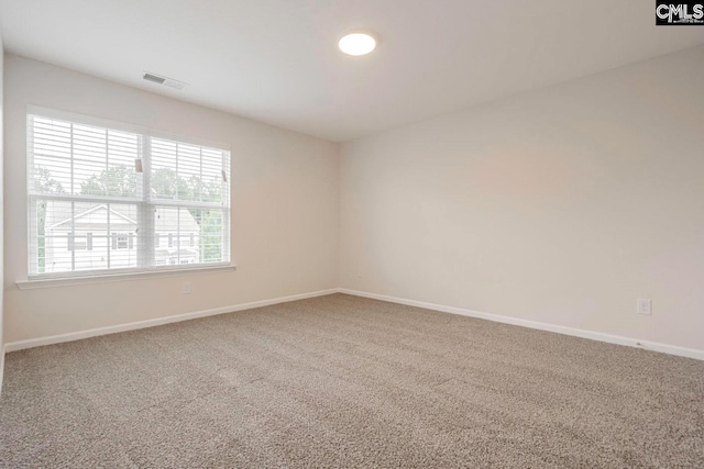 view of carpeted spare room