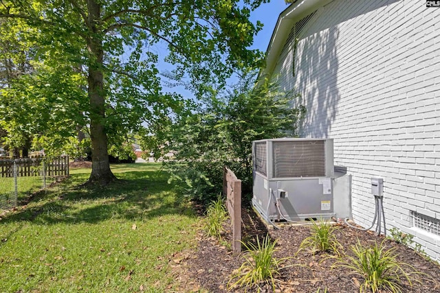 view of yard featuring central AC unit