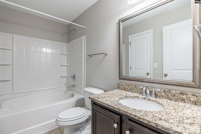 full bathroom featuring tile patterned floors, vanity, bathing tub / shower combination, and toilet