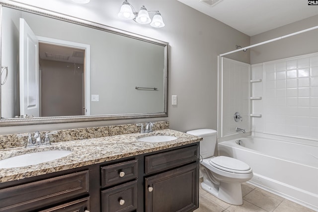 full bathroom with toilet, tub / shower combination, vanity, and tile patterned floors