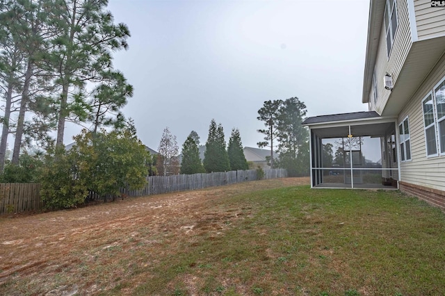 view of yard featuring a sunroom