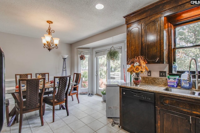 kitchen featuring black dishwasher, a healthy amount of sunlight, sink, and dark brown cabinets