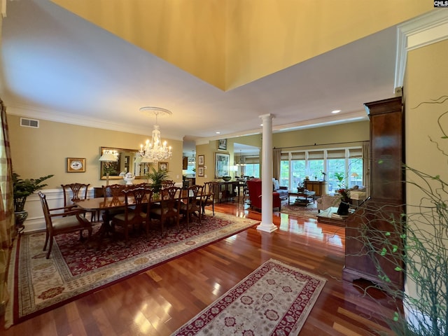 345 Old Wood Dr, Columbia, SC 29212 - dining room featuring decorative columns, ornamental molding, wood finished floors, and a chandelier
