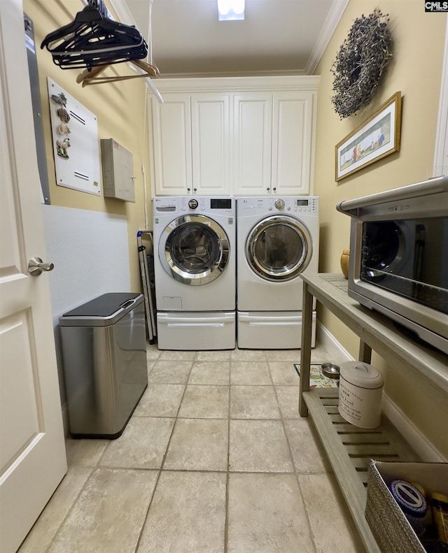 345 Old Wood Dr, Columbia, SC 29212 - laundry area with washing machine and dryer, cabinet space, and ornamental molding