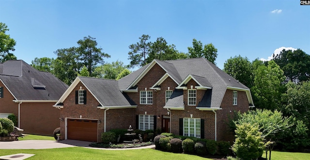 345 Old Wood Dr, Columbia, SC 29212 - view of front of property featuring brick siding, a front yard, a garage, and concrete driveway