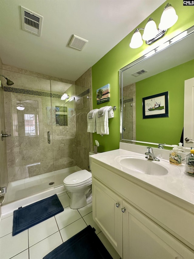 345 Old Wood Dr, Columbia, SC 29212 - bathroom featuring tile patterned floors, vanity, toilet, and a shower stall