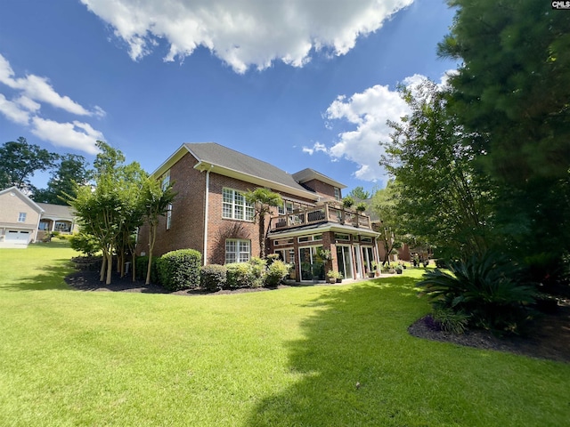 345 Old Wood Dr, Columbia, SC 29212 - back of house with brick siding, a balcony, and a yard
