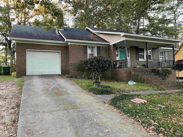 ranch-style house featuring a garage and a porch