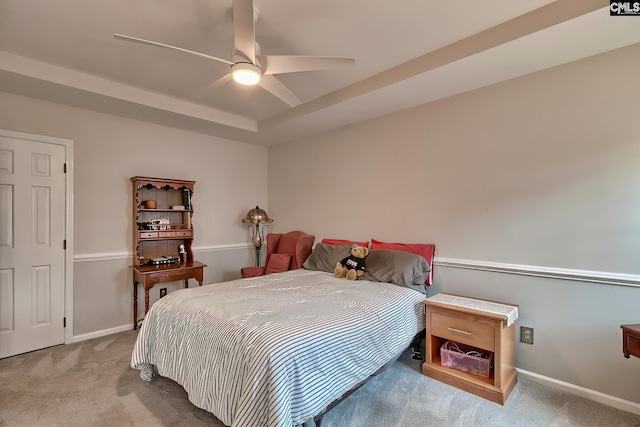 bedroom with light carpet and ceiling fan